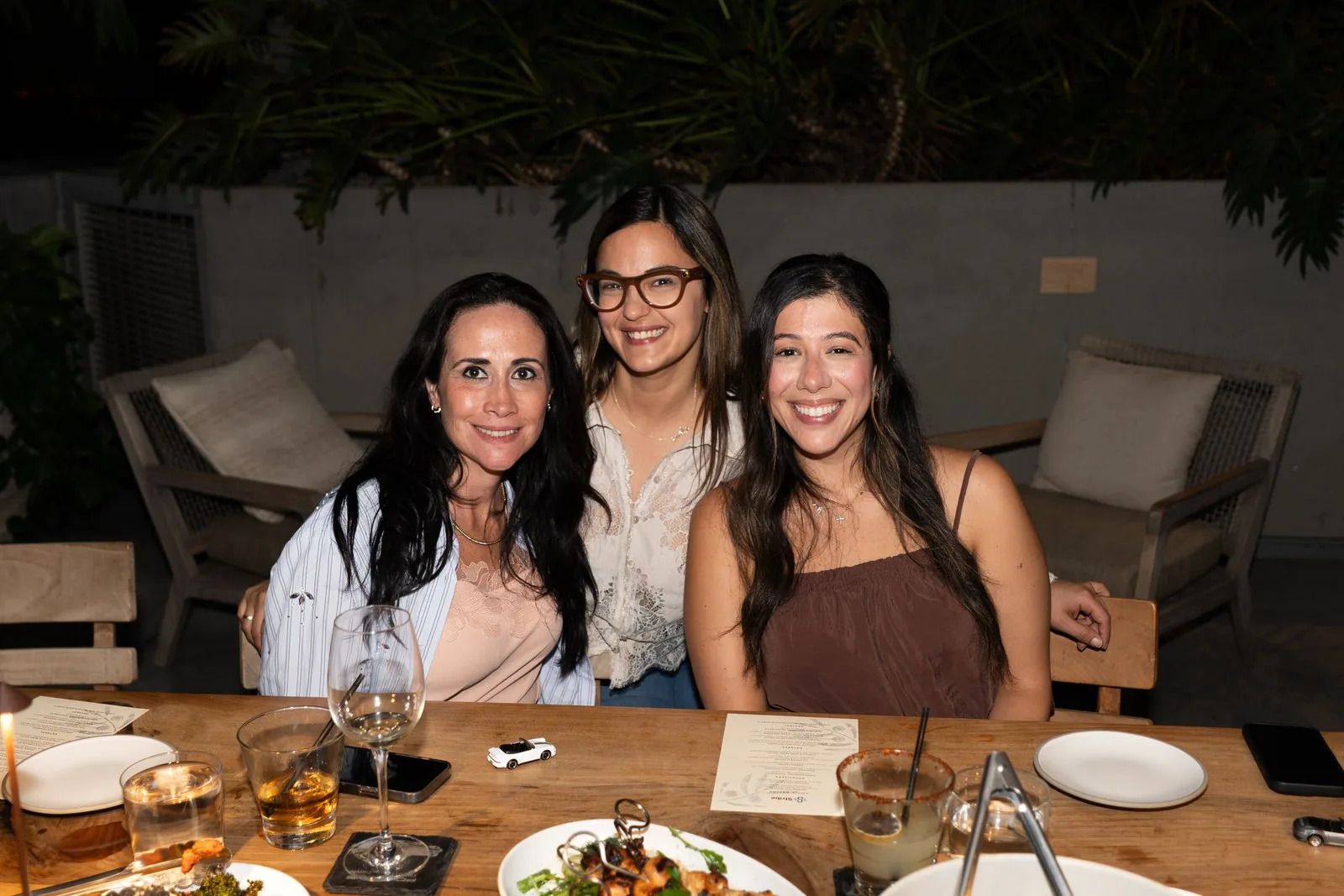Three IGNITE 2026 guests together at the dinner table Three IGNITE 2026 guests together at the dinner table