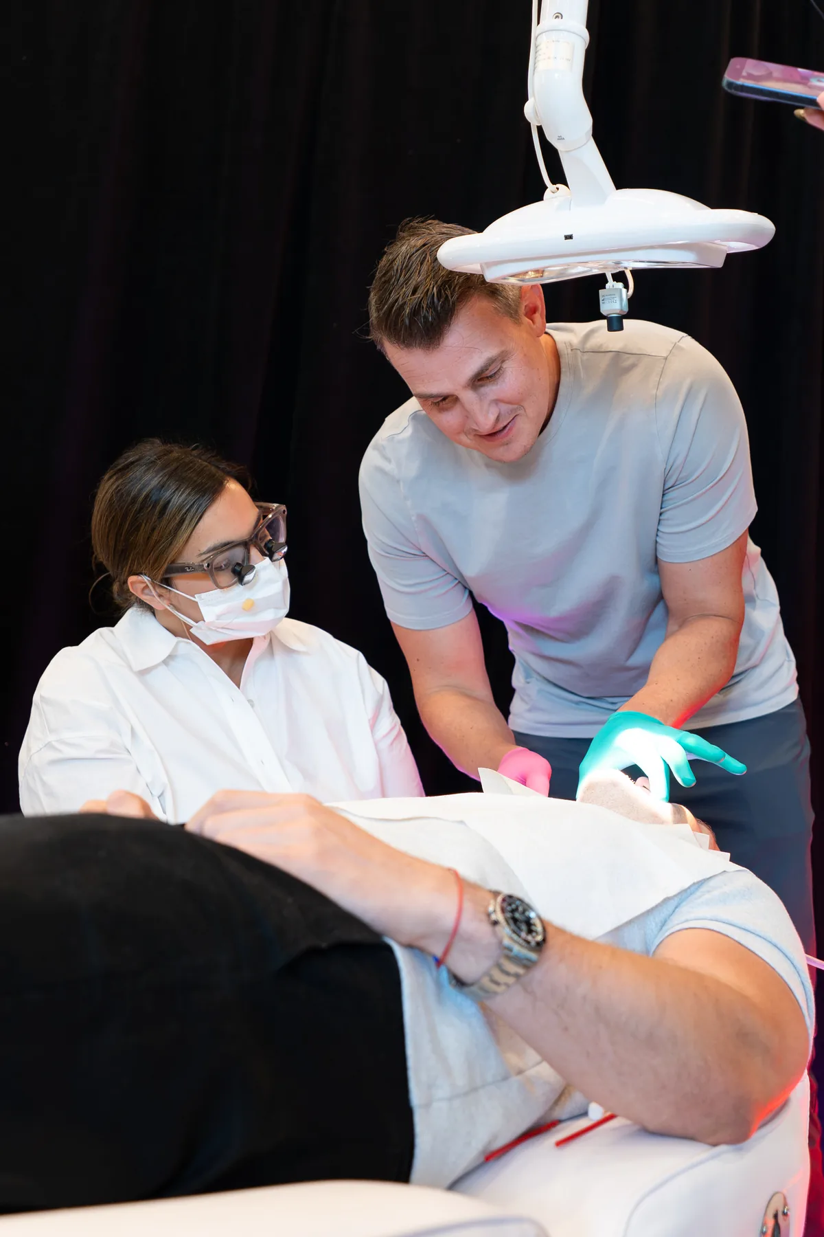 Two clinicians working side by side at the treatment chair on the hands-on day at IGNITE 2026 Two clinicians working side by side at the treatment chair on the hands-on day at IGNITE 2026